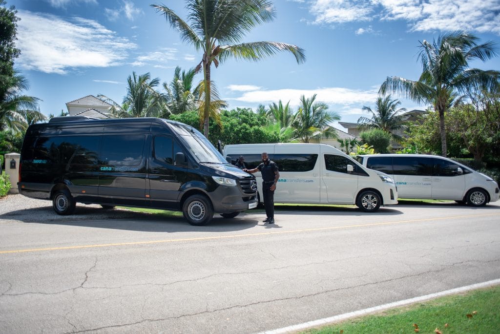 Cana Transfers fleet in Punta Cana: Mercedes-Benz Sprinter and Toyota Hiace vans with their driver