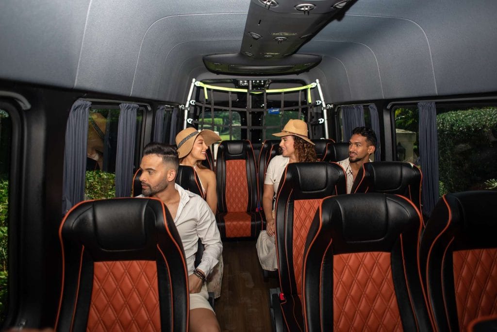 Comfortable minibus interior with passengers on a Punta Cana airport transfer